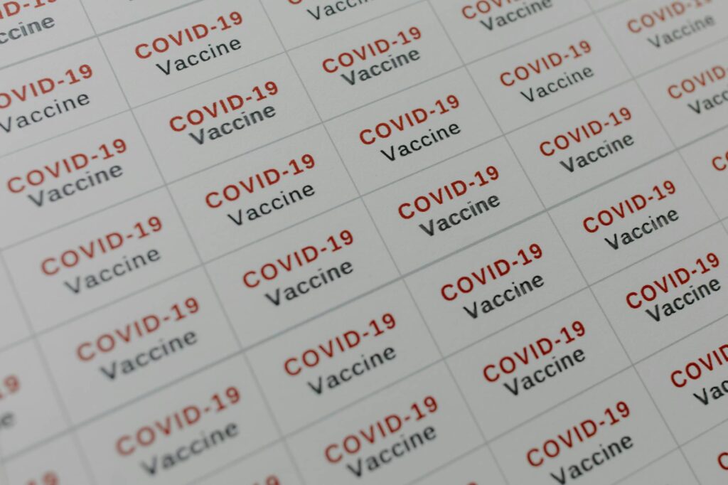 Grid of COVID-19 vaccine labels ready for medical and healthcare applications.