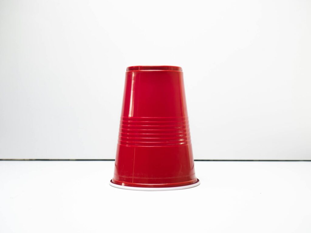 Red solo cup on a white background, perfect for parties and events.