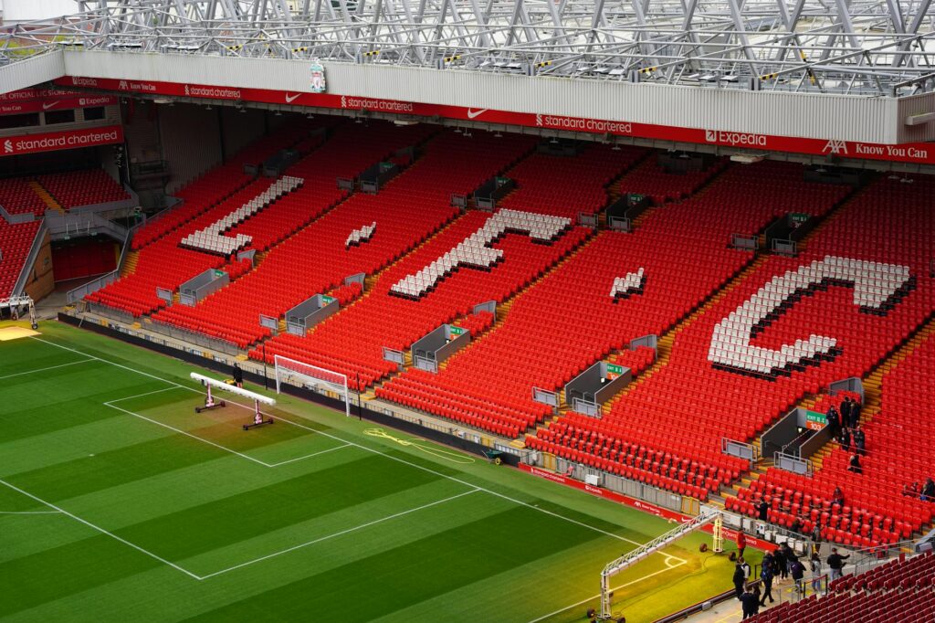 View of Anfield Stadium seating with prominent LFC letters. Perfect capture of iconic Liverpool FC venue.