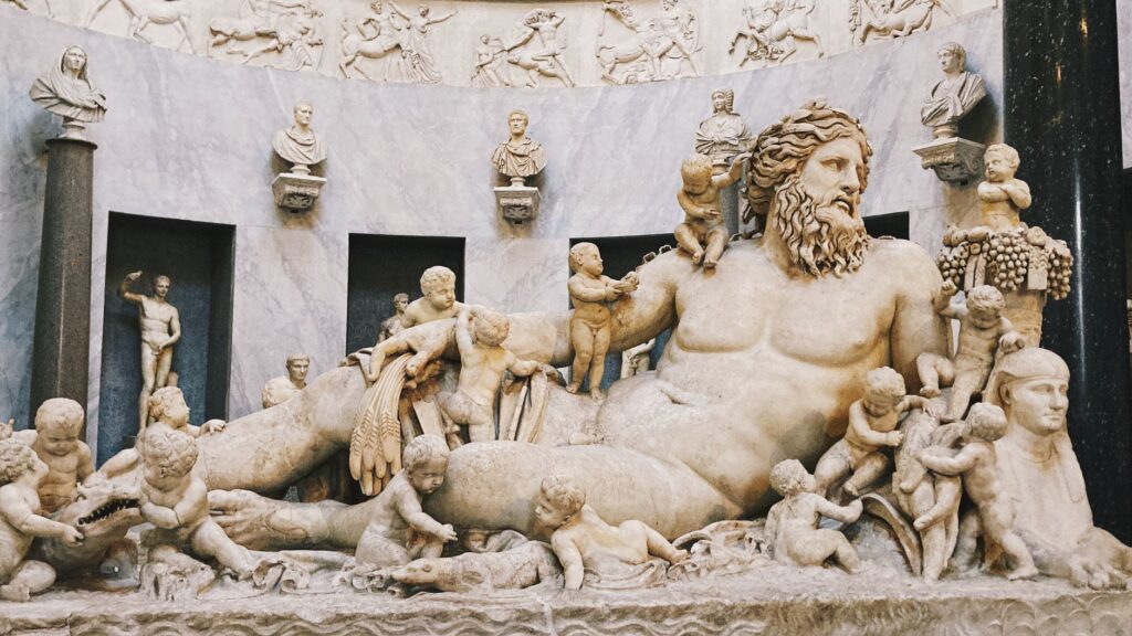 Detailed view of an ancient Roman marble sculpture depicting a mythological scene, rich in detail and artistry.