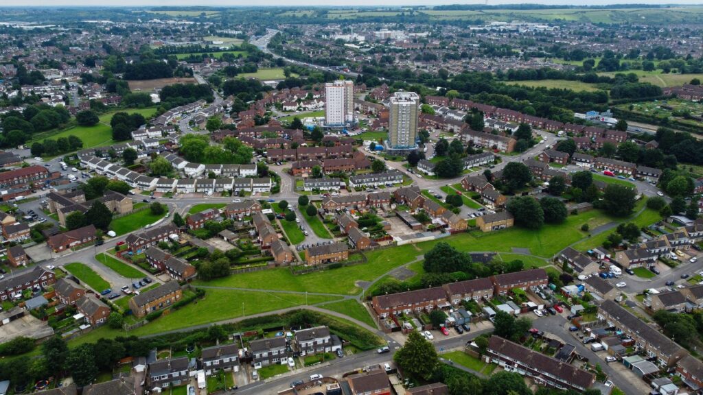 Aerial shot of Luton, England showcasing the urban landscape and residential area.